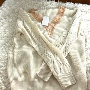 Sweater lacing in neck